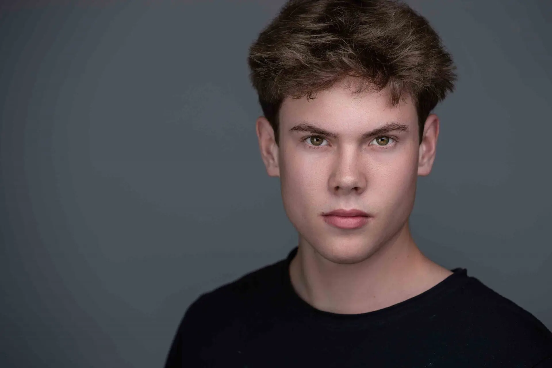 Actor headshot Sydney, young man on dark background
